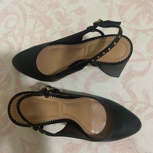 Vince Camuto black closed toed heels.